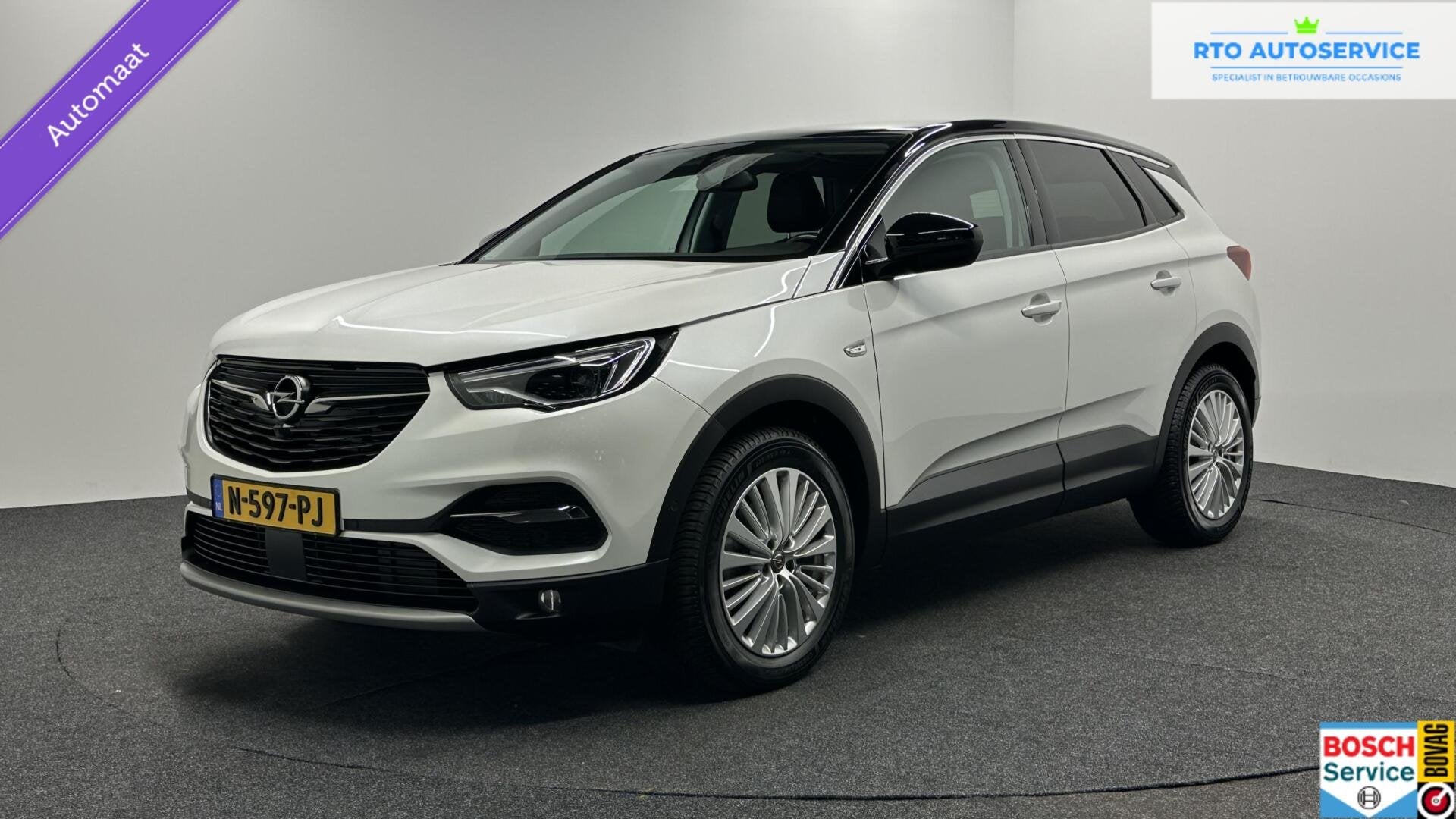 Opel Grandland X 1.2 Turbo Business Elegance LEER TREKHAAK C, Gebruikt, 1199 cc, Met garantie (alle), Wit