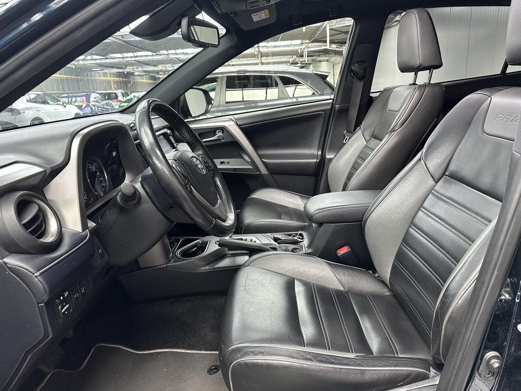 Toyota RAV4 2.5 Hybrid Black Edition, Auto's, Gebruikt, Euro 6, Zwart, Hybride Elektrisch/Benzine