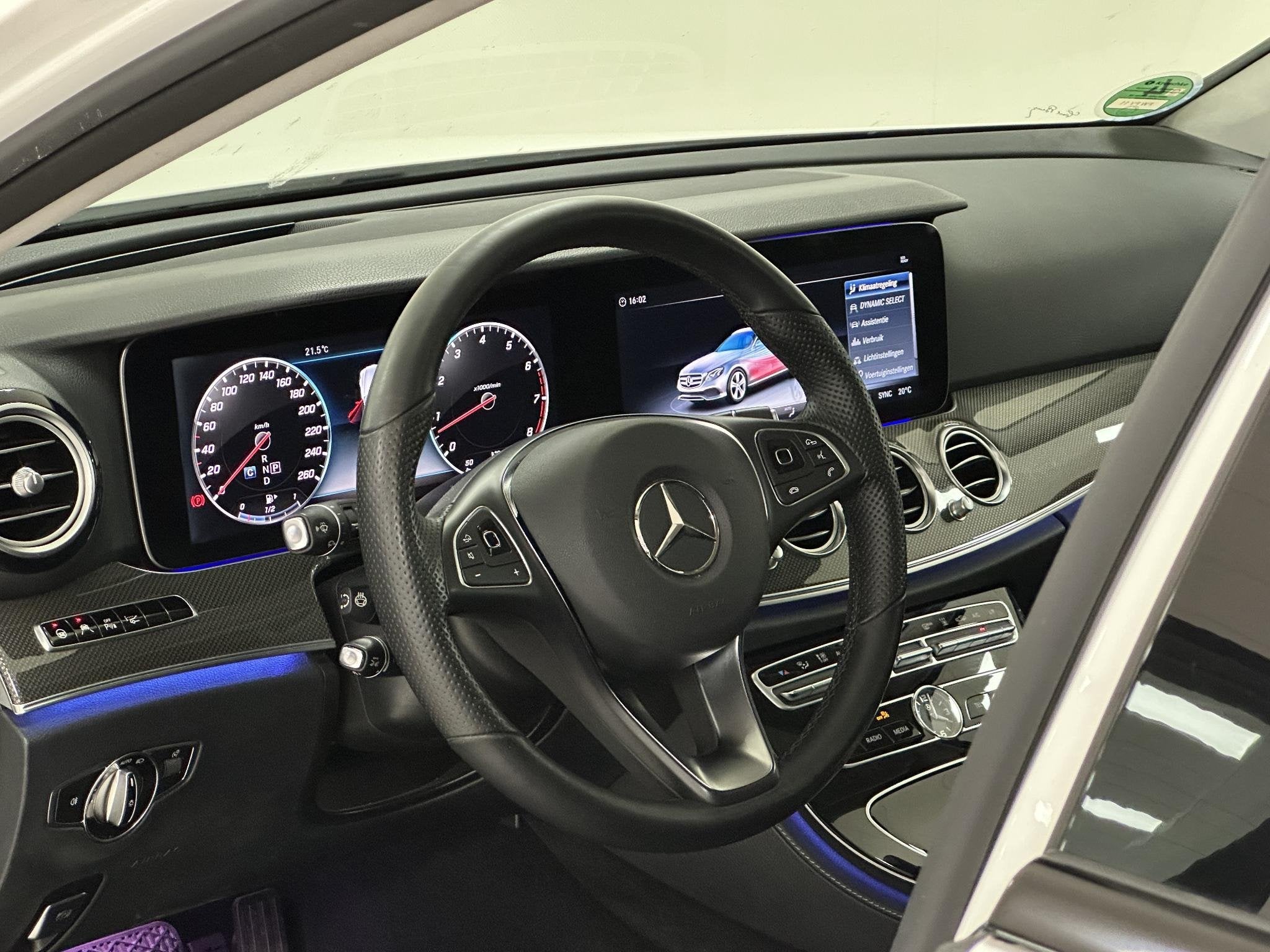 Mercedes-Benz E-klasse Estate 400 4MATIC Premium Plus ELEKTR, Auto's, Automaat, Gebruikt, Met garantie (alle), Parkeerassistent