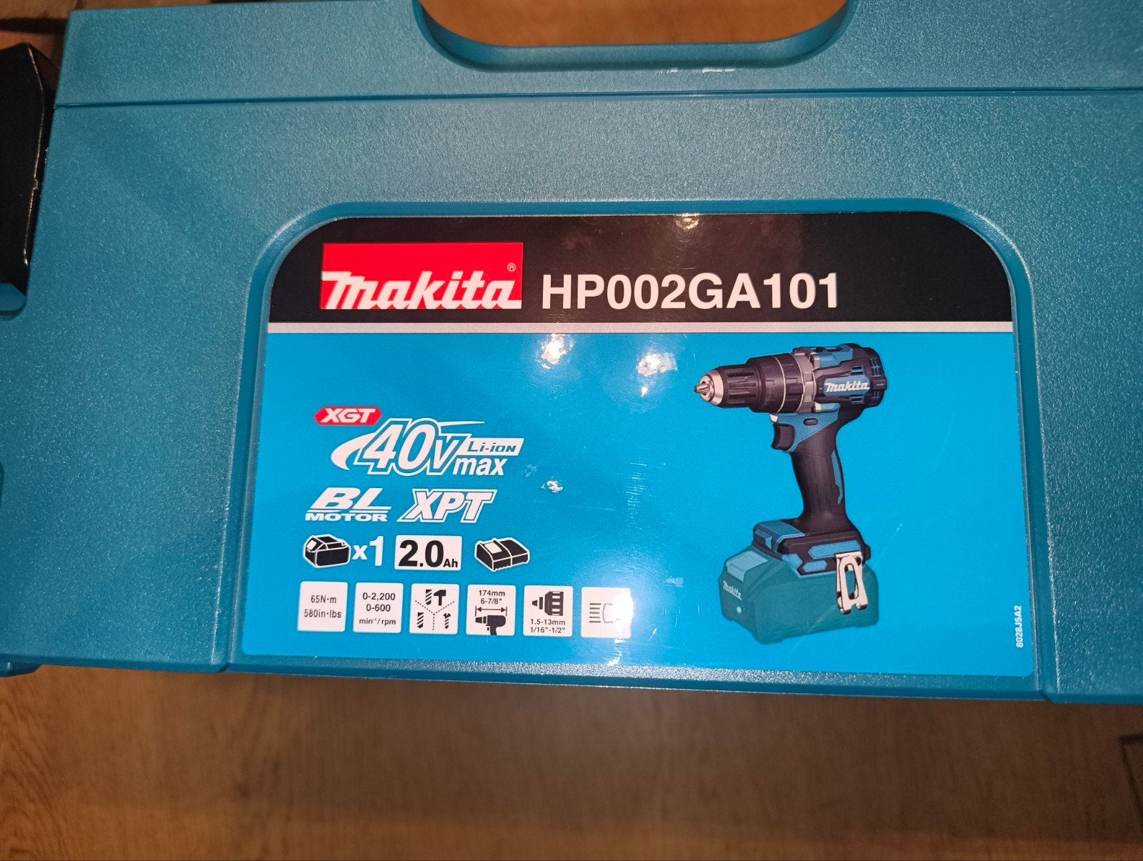 Foto 3 van Makita XGT 40V Klopboor/schroef + 2.0ah accu en snellader.