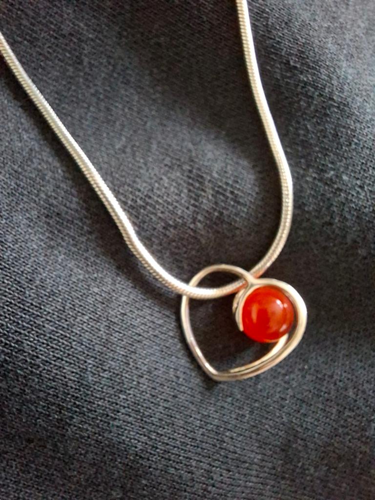 Echte melano ketting met hart., Ophalen, Zo goed als nieuw, Zilver, Hart