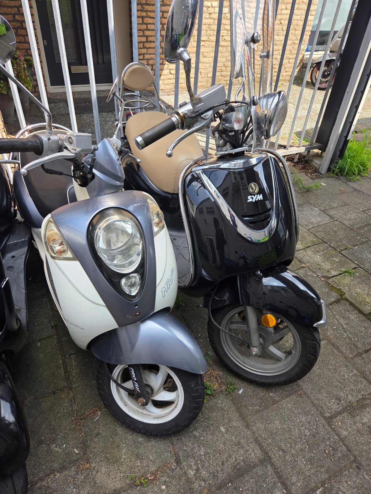sym mio en sym allo 25 km, Fietsen en Brommers, Scooters | SYM, Gebruikt, Allo, Ophalen of Verzenden, Benzine