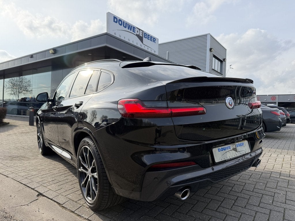BMW X4 xDrive20i M-sport Pano-Dak | Trekhaak | Leer | Memory, Auto's, BMW, Automaat, Euro 6, 4 cilinders, Zwart