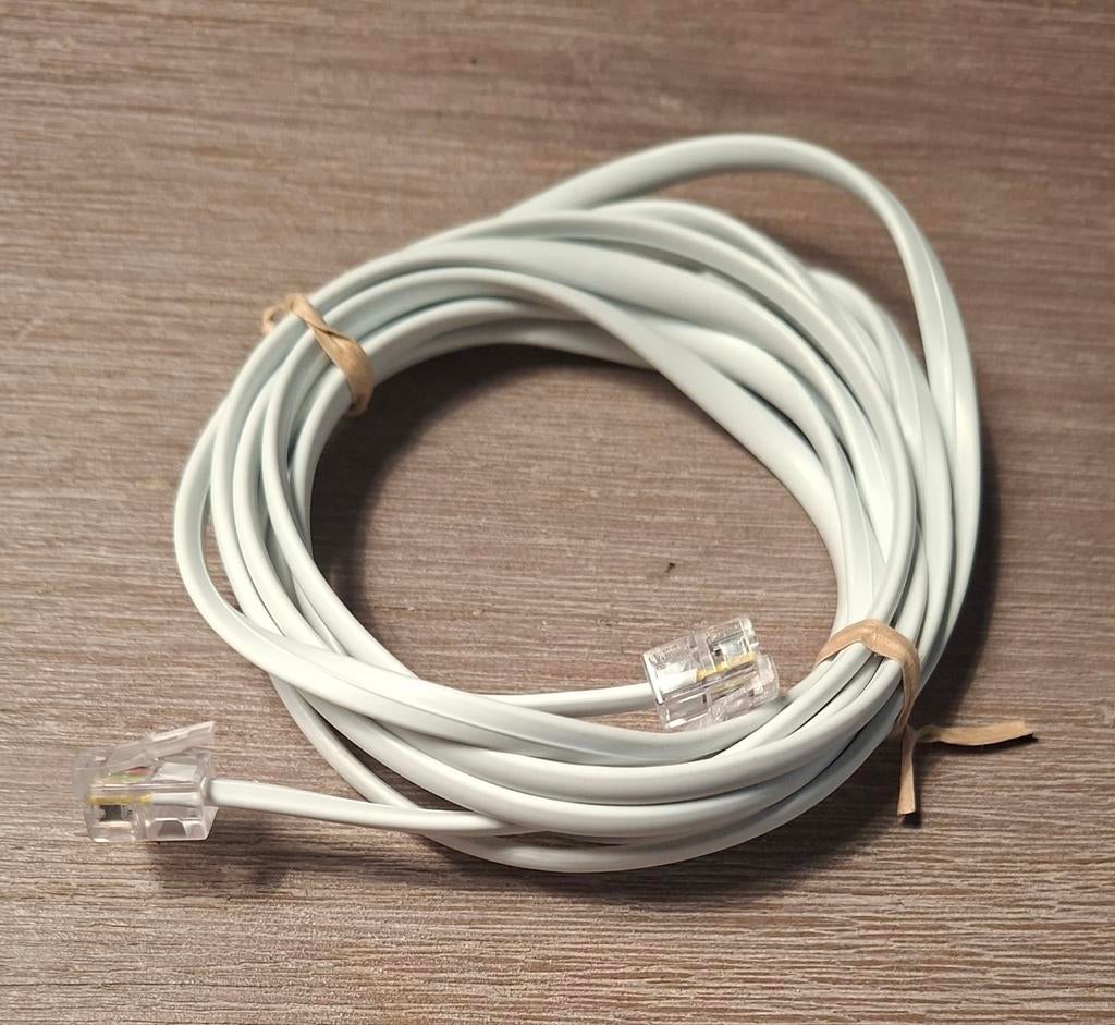 Telefoonkabel. RJ11. 2 meter., Ophalen of Verzenden, Zo goed als nieuw