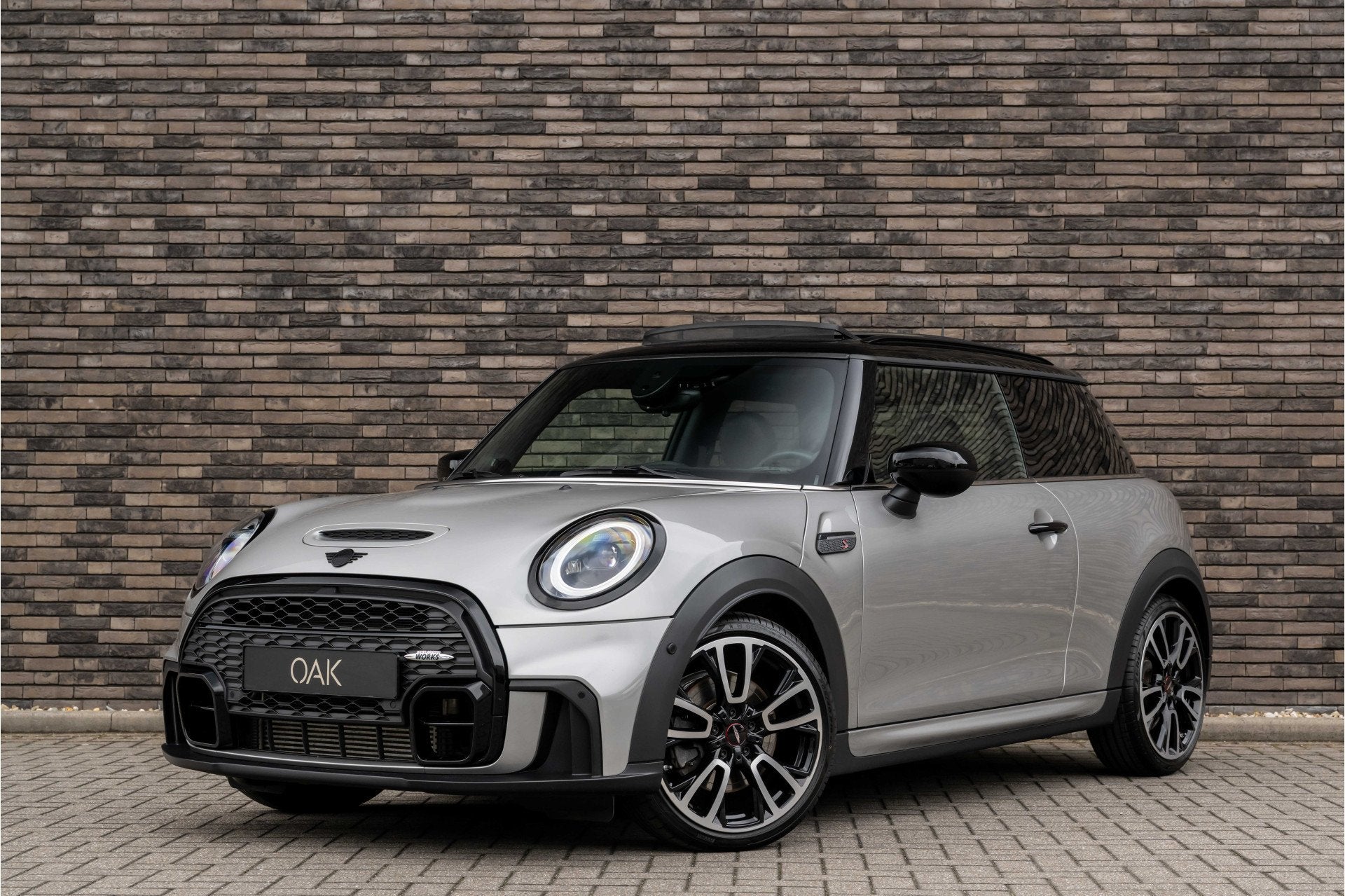 MINI Mini 2.0 Cooper S F1 Aut. | JCW-Trim | Navi | Panorama, Auto's, Automatische klimaatregeling, Gebruikt, Zwart, Leder