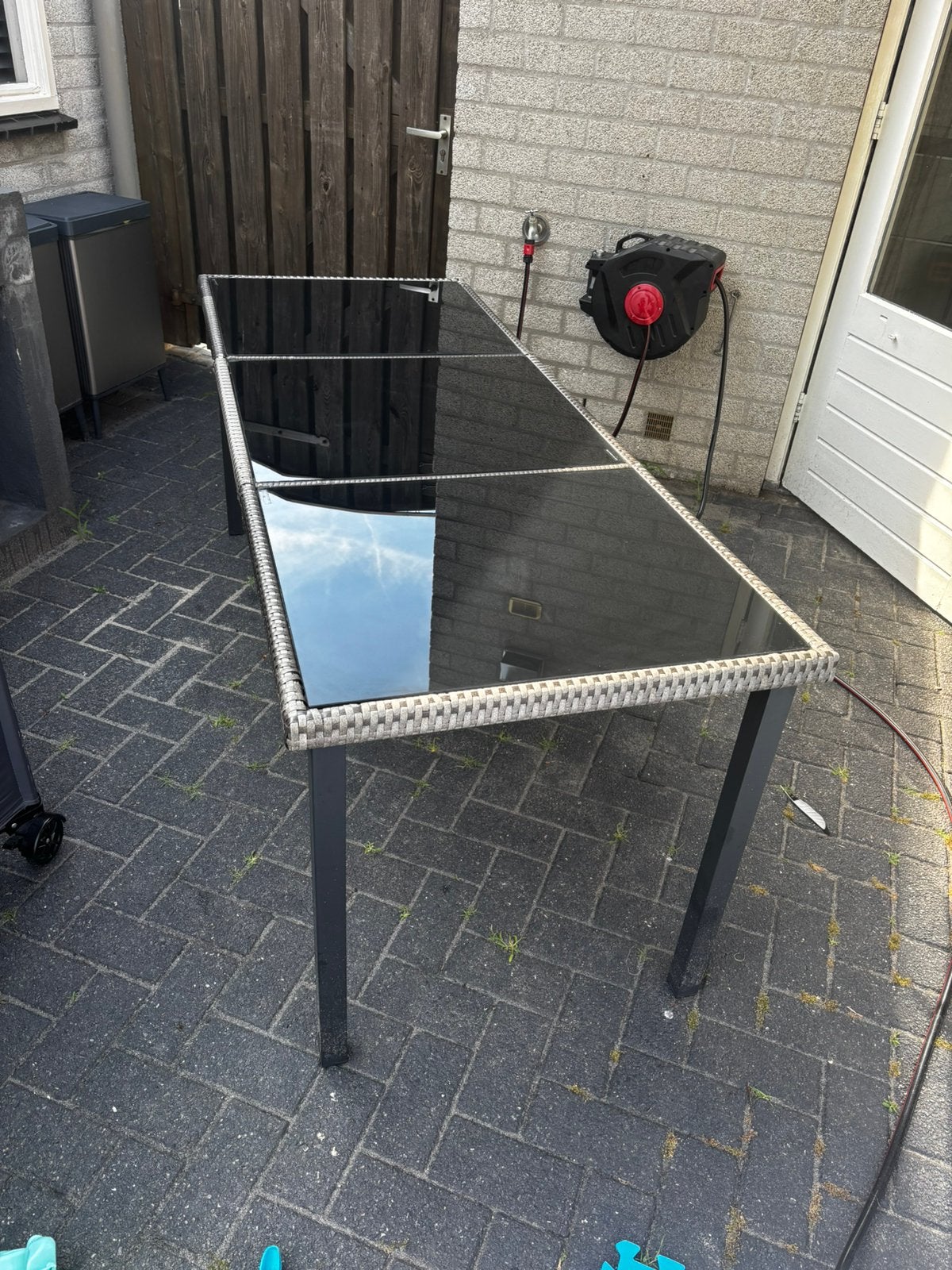 Tuintafel rotan met glazen tafel blad 210x70, Ophalen, Gebruikt, Rechthoekig