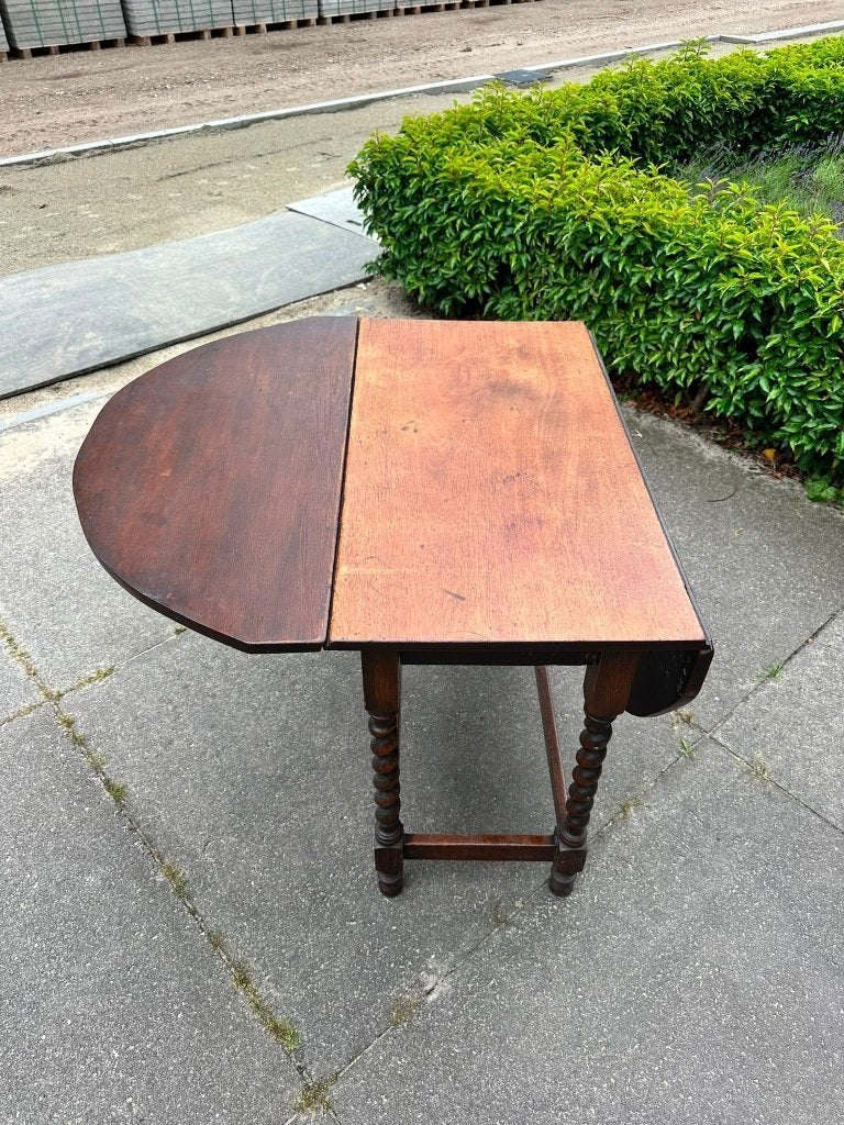 Antieke houten klaptafel met gedraaide poten, Ophalen
