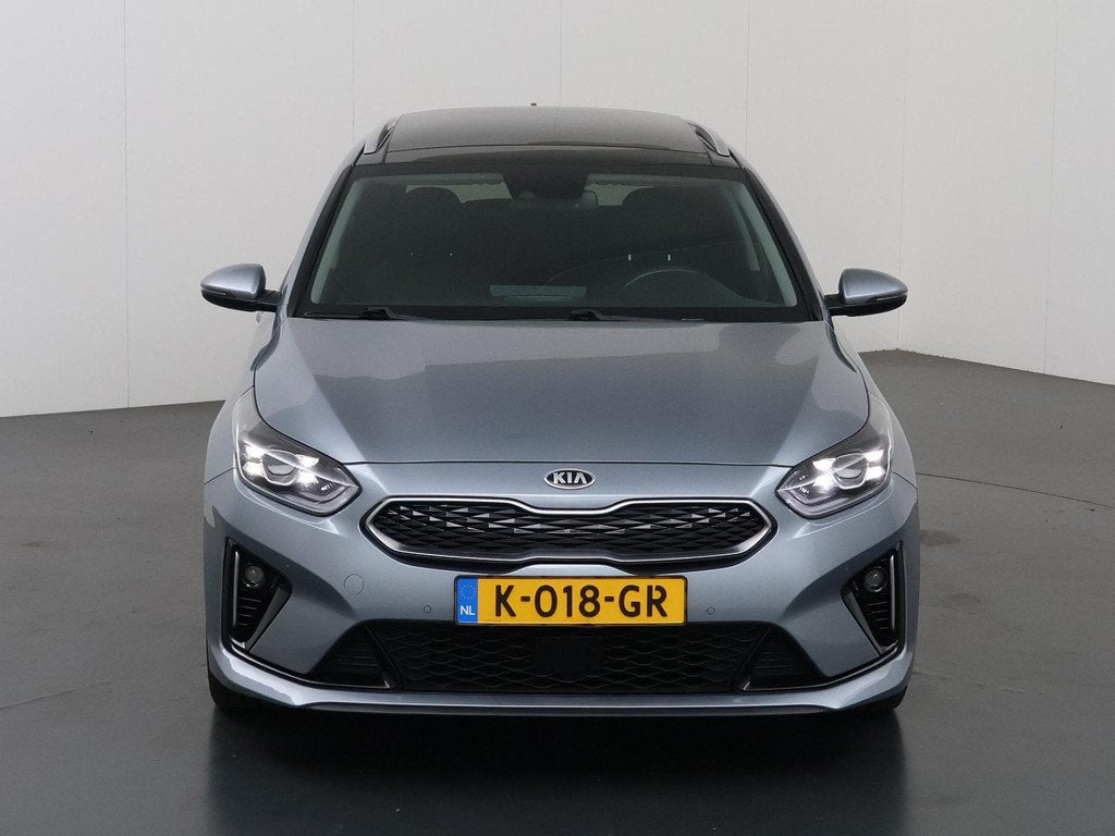 Kia Ceed Sportswagon 1.6 GDI PHEV ExecutiveLine | Trekhaak |, Auto's, Kia, Gebruikt, Zilver of Grijs, 1300 kg, Lichtsensor