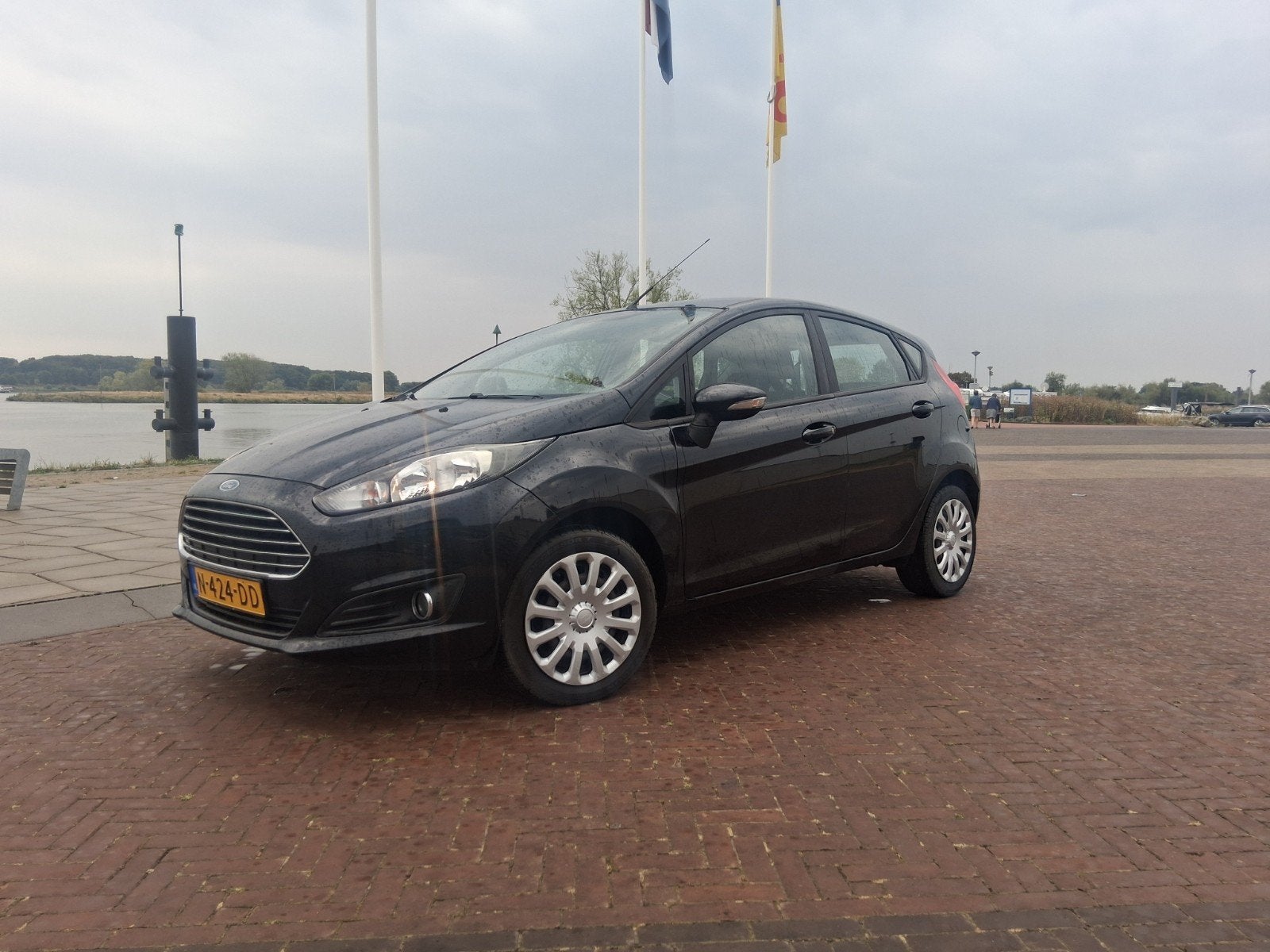 Ford Fiësta 1.25 60KW 5DR 2014 Zwart, Auto's, Voorwielaandrijving, 1242 cc, Zwart, Handgeschakeld