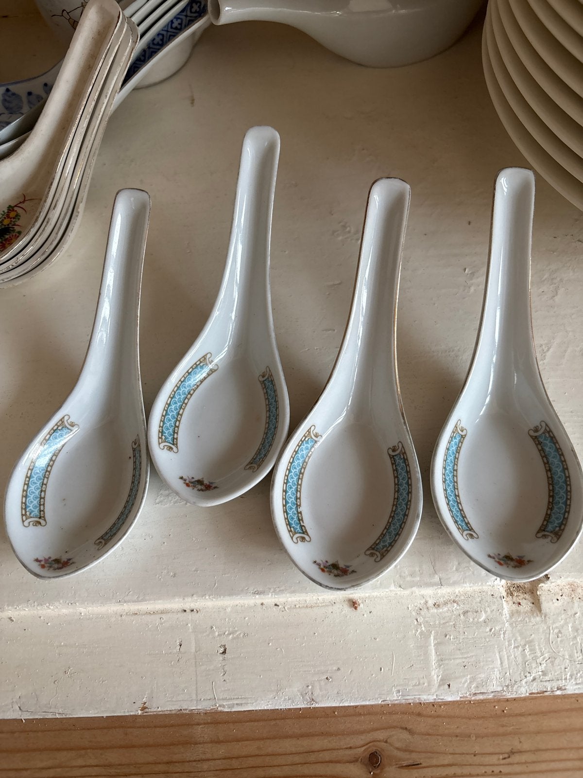 Set van 4 porseleinen Chinese soeplepels, Ophalen