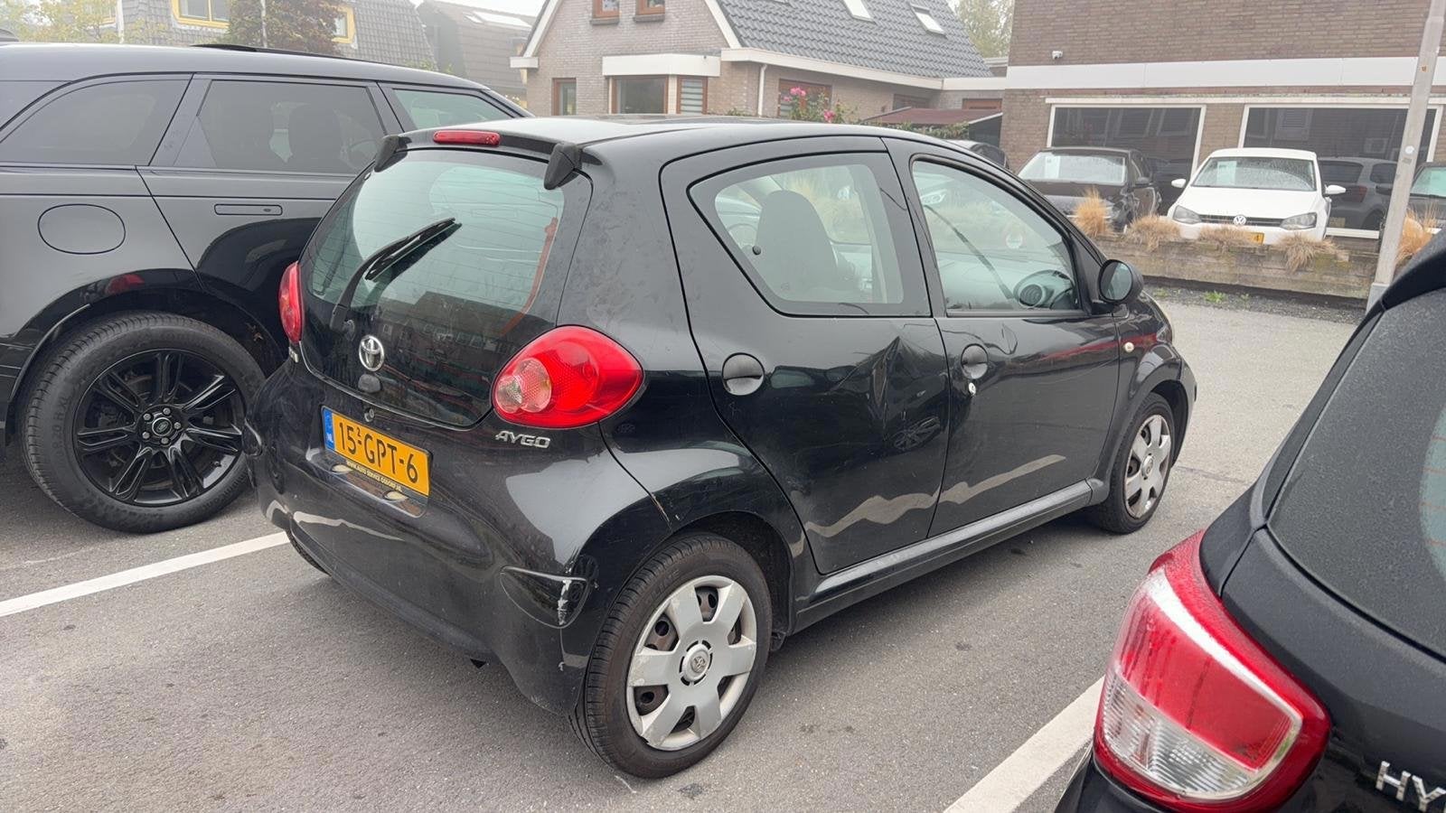 Toyota Aygo 1.0-12V Airco *APK 08-2027* KOPPELING DEFECT, Auto's, Voorwielaandrijving, Stof, Gebruikt, Zwart