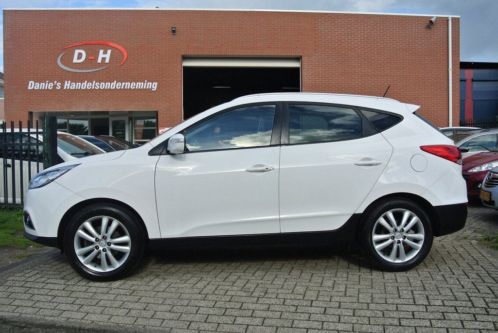 Hyundai Ix35 2.0i i-Catcher airco leder automaat panoramadak, Auto's, Hyundai, Gebruikt, 4 cilinders, 1600 kg, Stoelverwarming