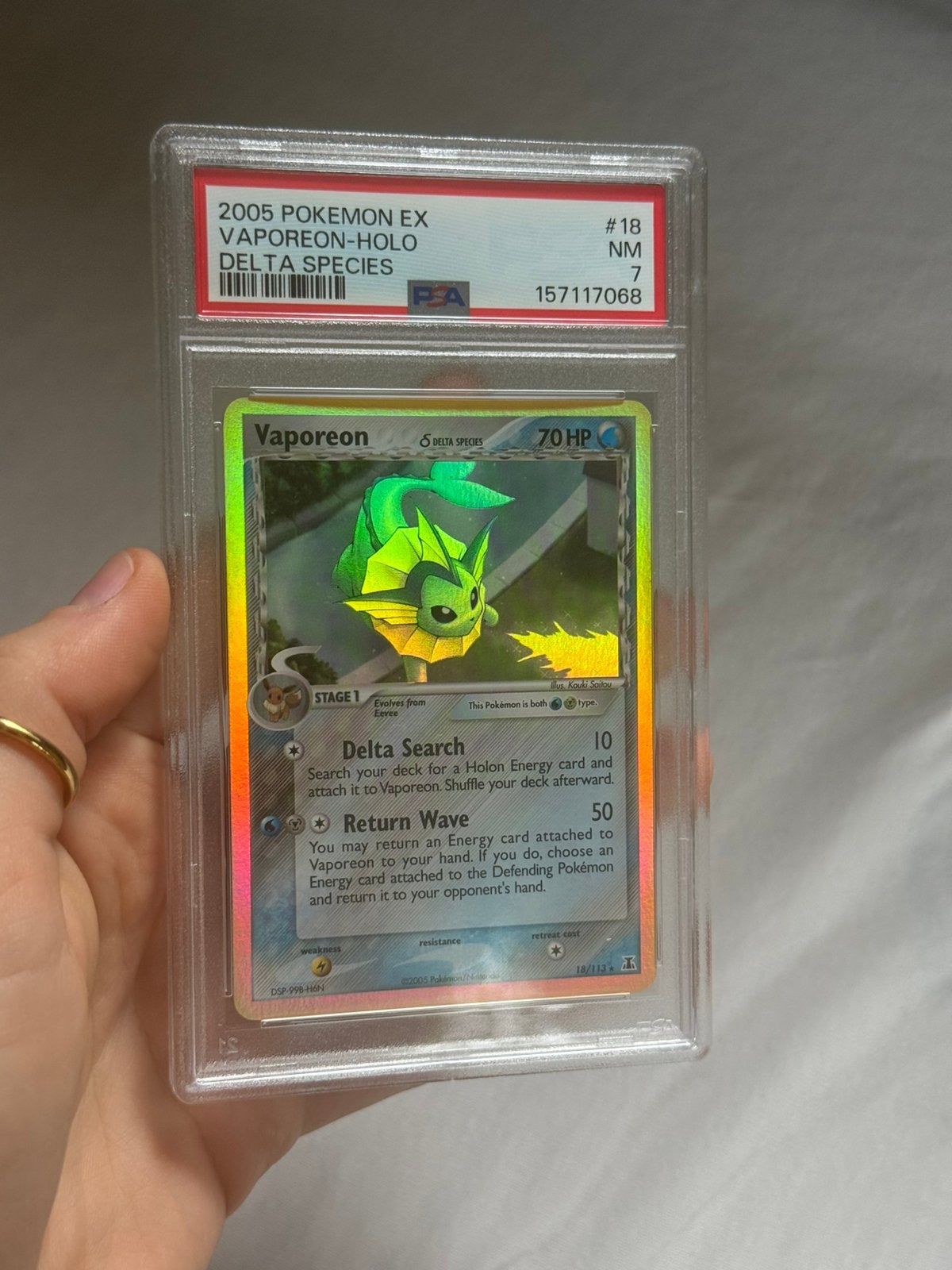 Vapereon Holo #18 PSA 7 - EX Delta Spieces 2005, Ophalen of Verzenden, Zo goed als nieuw