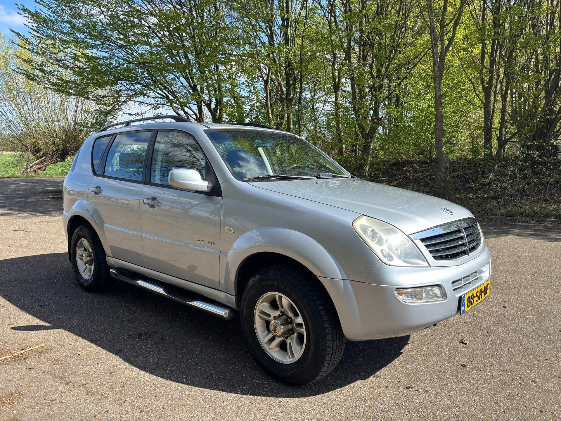 SsangYong Rexton RJ 230 | 1e eig. | NAP | APK 05-2027, Auto's, Automaat, Stof, Gebruikt, Zwart
