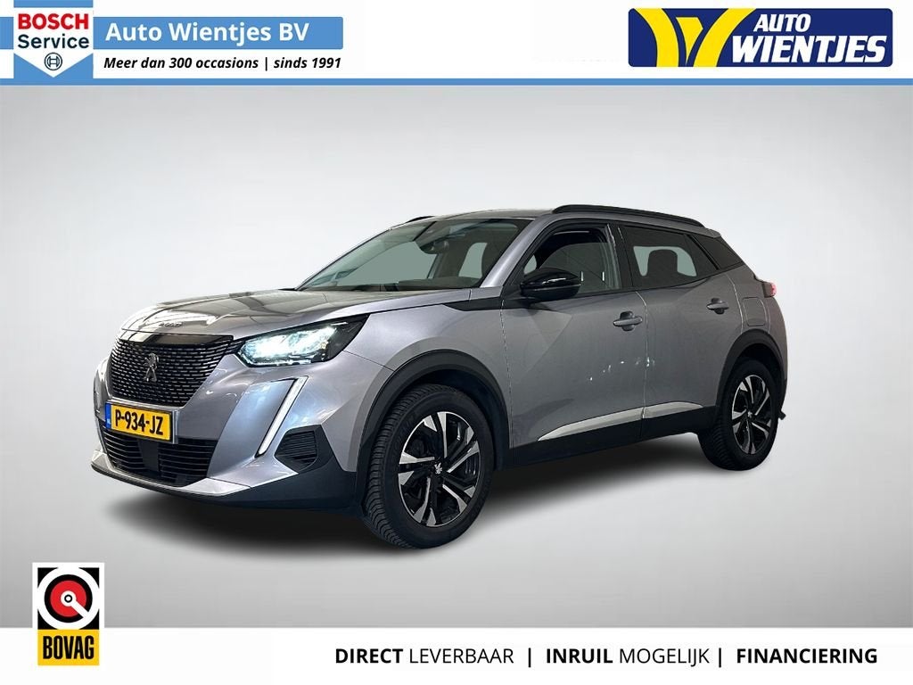 Peugeot 2008 1.2 PureTech Aut | Allure Pack | Navi | Camera, Auto's, Gebruikt, Euro 6, 1199 cc, Regensensor