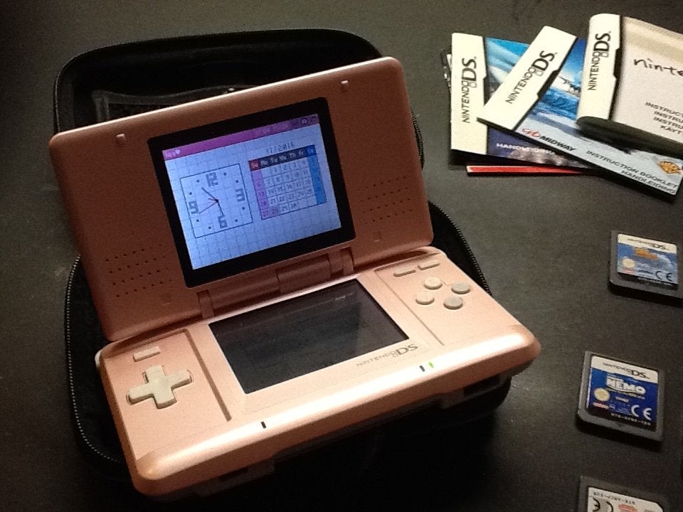 Roze Nintendo DS Lite met 15 games en hoes, Spelcomputers en Games, Ophalen, Roze, DS Lite, Gebruikt