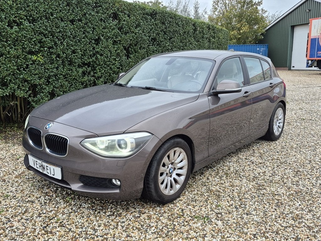 BMW 1-Serie 116i 136PK Limited Edition Business + Nieuw Type, Auto's, 136 pk, Gebruikt, 4 cilinders, Bruin