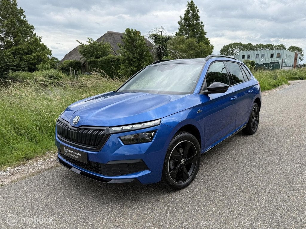 Skoda Kamiq 1.5 TSI ACT Monte Carlo / Pano / CarPlay / Cam, Stof, Zwart, 4 cilinders, 150 pk