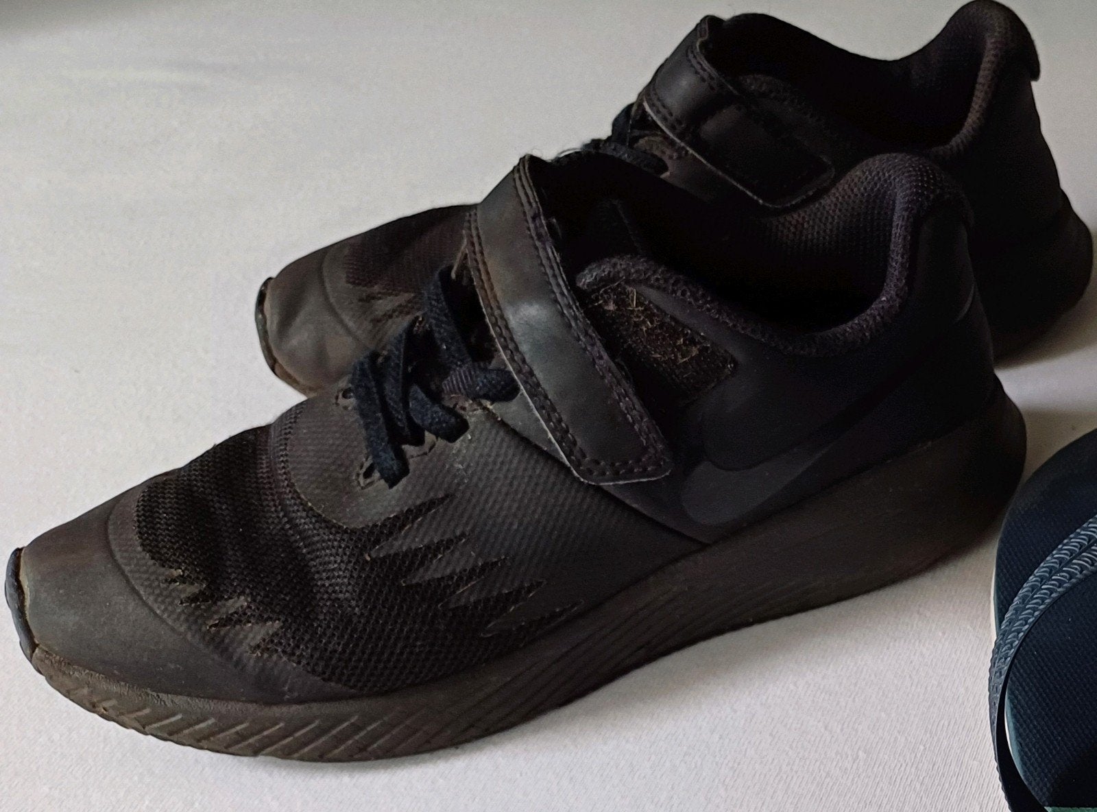 Zwarte Nike's mt 33, Kinderen en Baby's, Babykleding | Schoentjes en Sokjes, Ophalen, Nike, Jongetje, Gebruikt