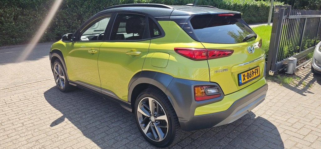 Hyundai Kona 1.6 T-GDI 4WD Premium, Automaat, 15 km/l, 4 cilinders, Leder en Stof
