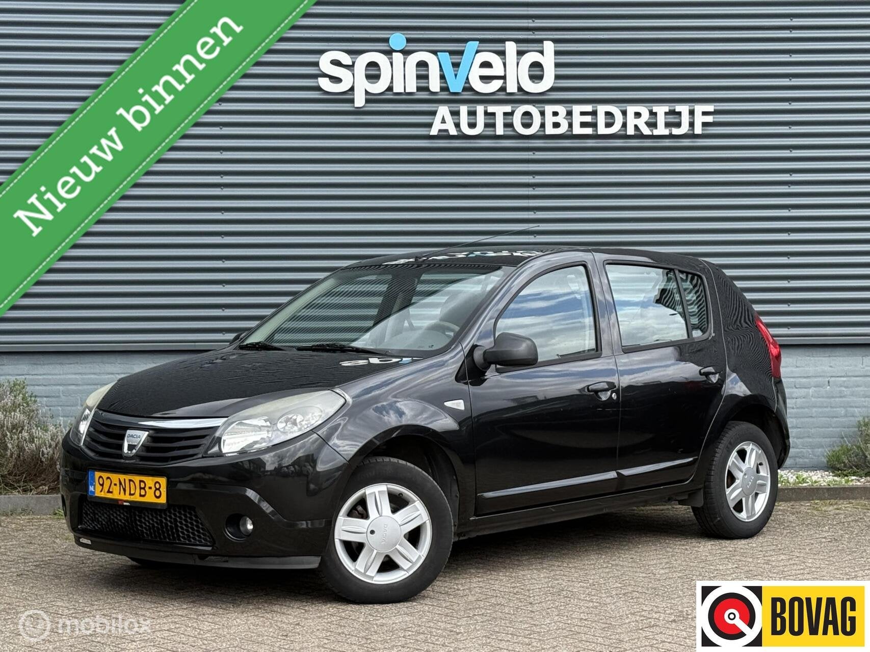 Dacia Sandero 1.2 Blackline - Airco - Nap - Elektrische rame, Auto's, Voorwielaandrijving, Gebruikt, Zwart, Origineel Nederlands