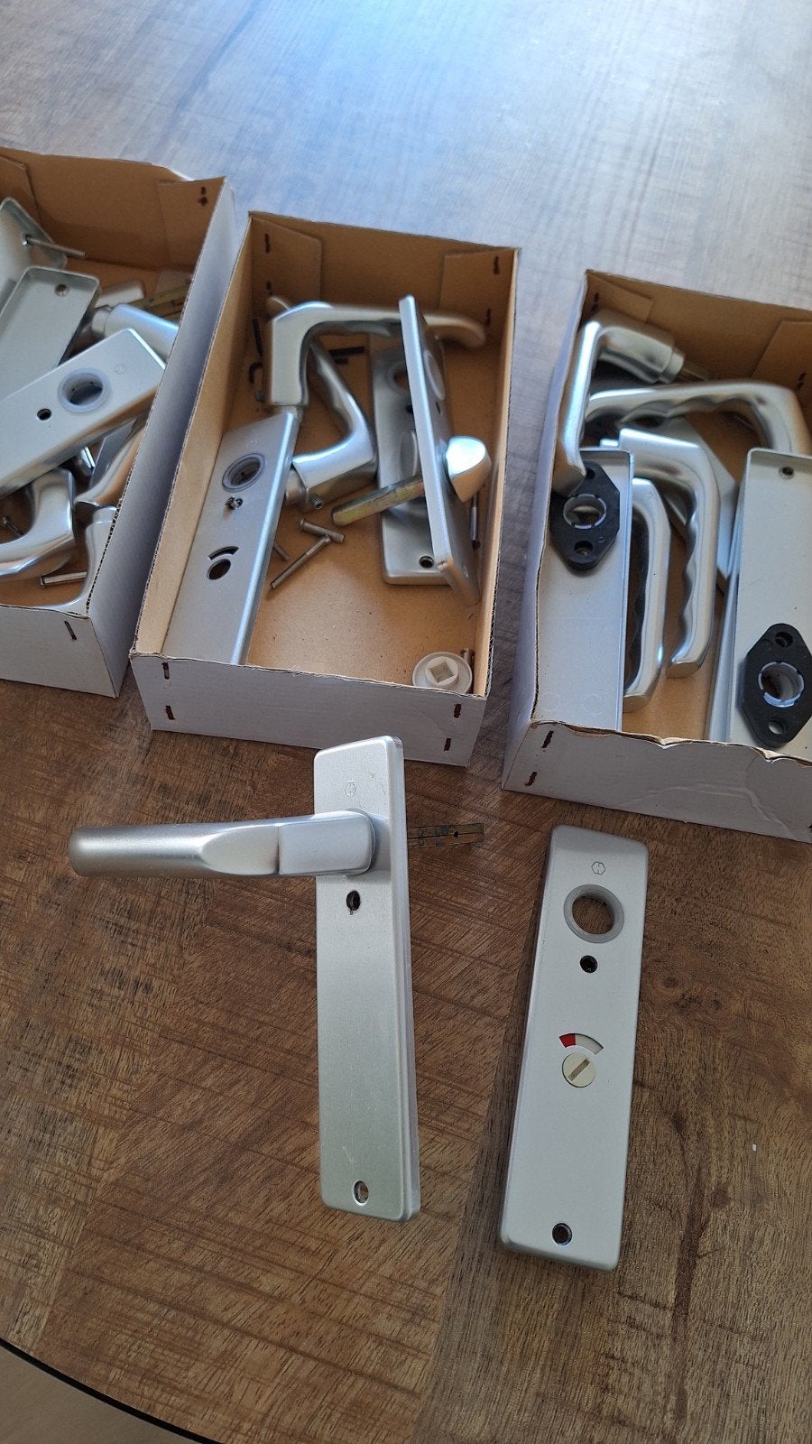 Deurbeslag, klinken en sloten, 12 sets, Ophalen of Verzenden, Gebruikt, Rvs, Klink of Kruk