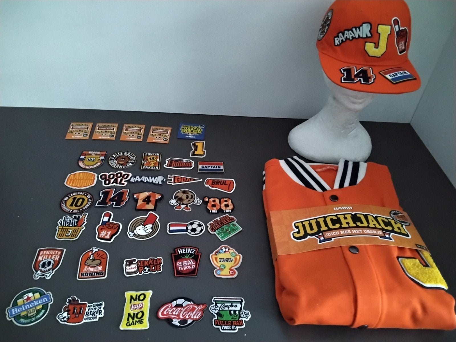 Jumbo juich jack L/ XL  pet en emblemen. BESCHRIJVING LEZEN., Verzamelen, Supermarktacties, Jumbo, Ophalen of Verzenden