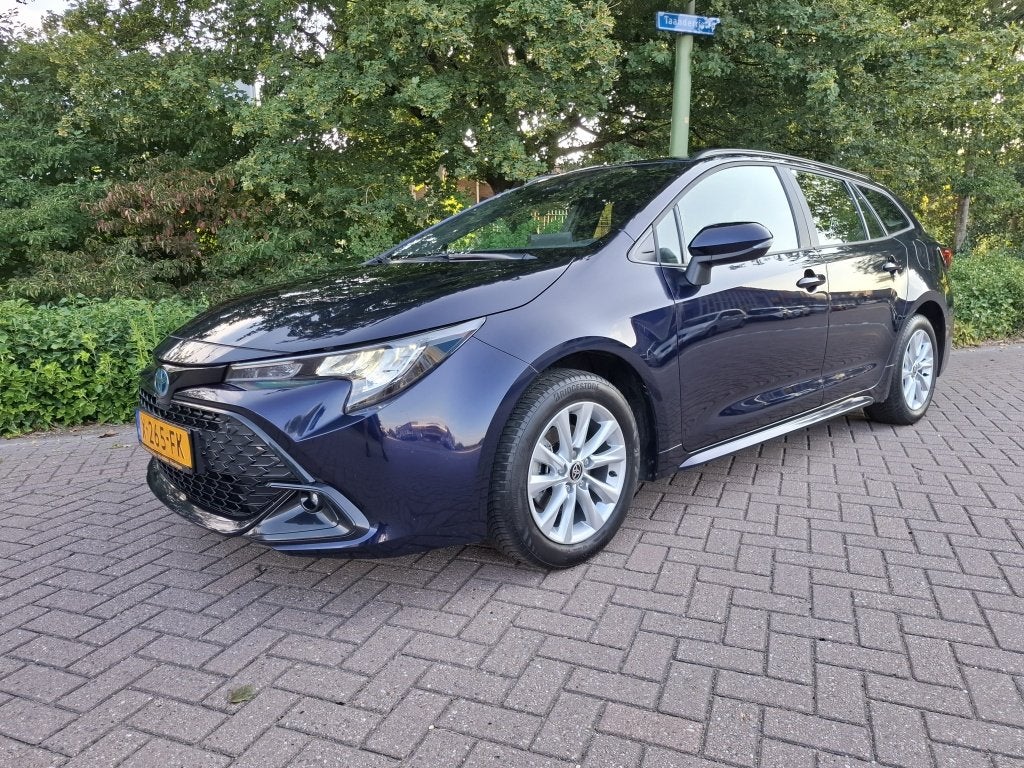 Toyota Corolla Touring Sports Hybrid 140 Active (bj 2024), Auto's, 12 maanden, 450 kg, Gebruikt, 4 cilinders