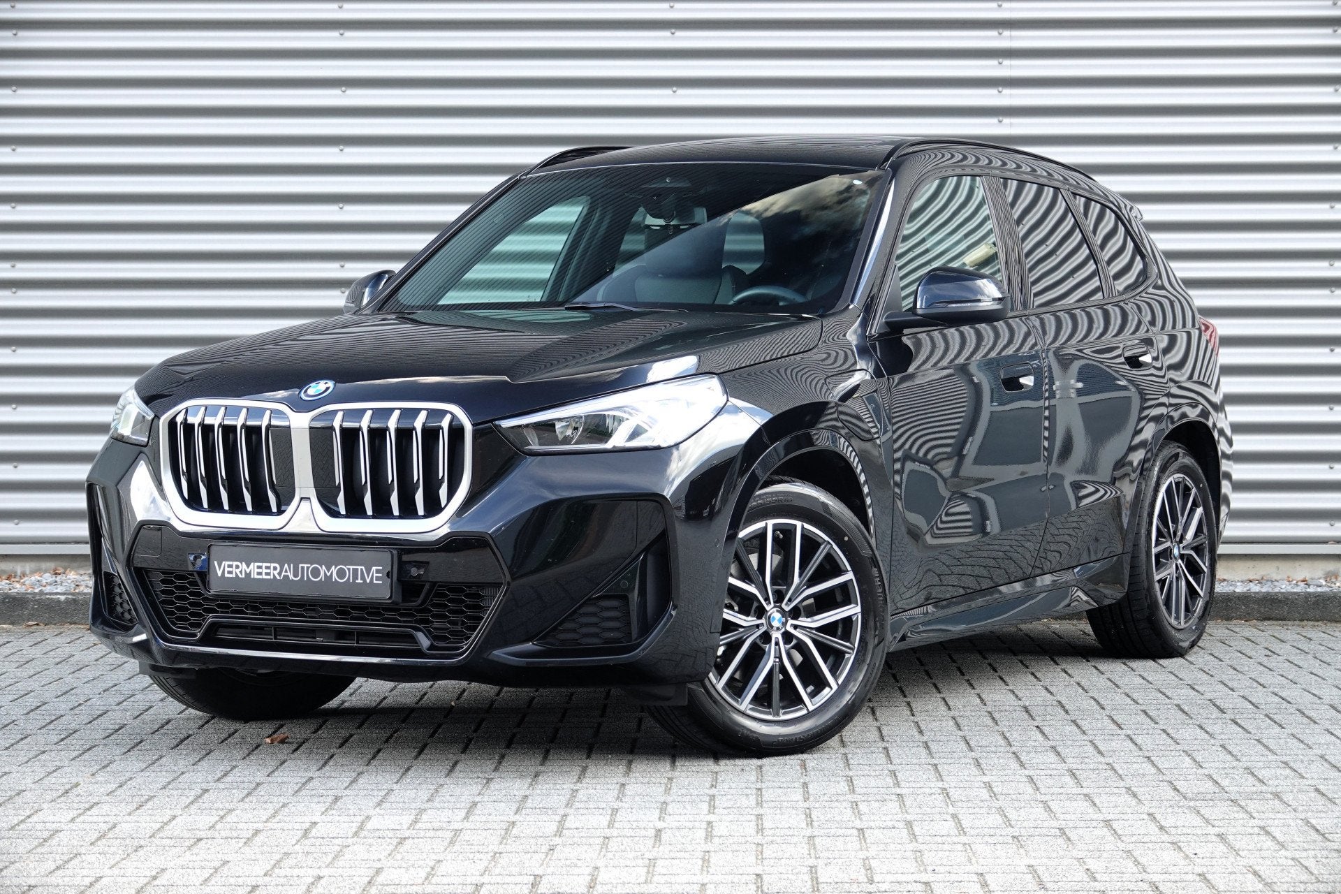 BMW X1 xDrive25e | M-Sport | Panodak | Trekhaak | Camera | L, Auto's, Gebruikt, Zwart, Zwart, Bedrijf