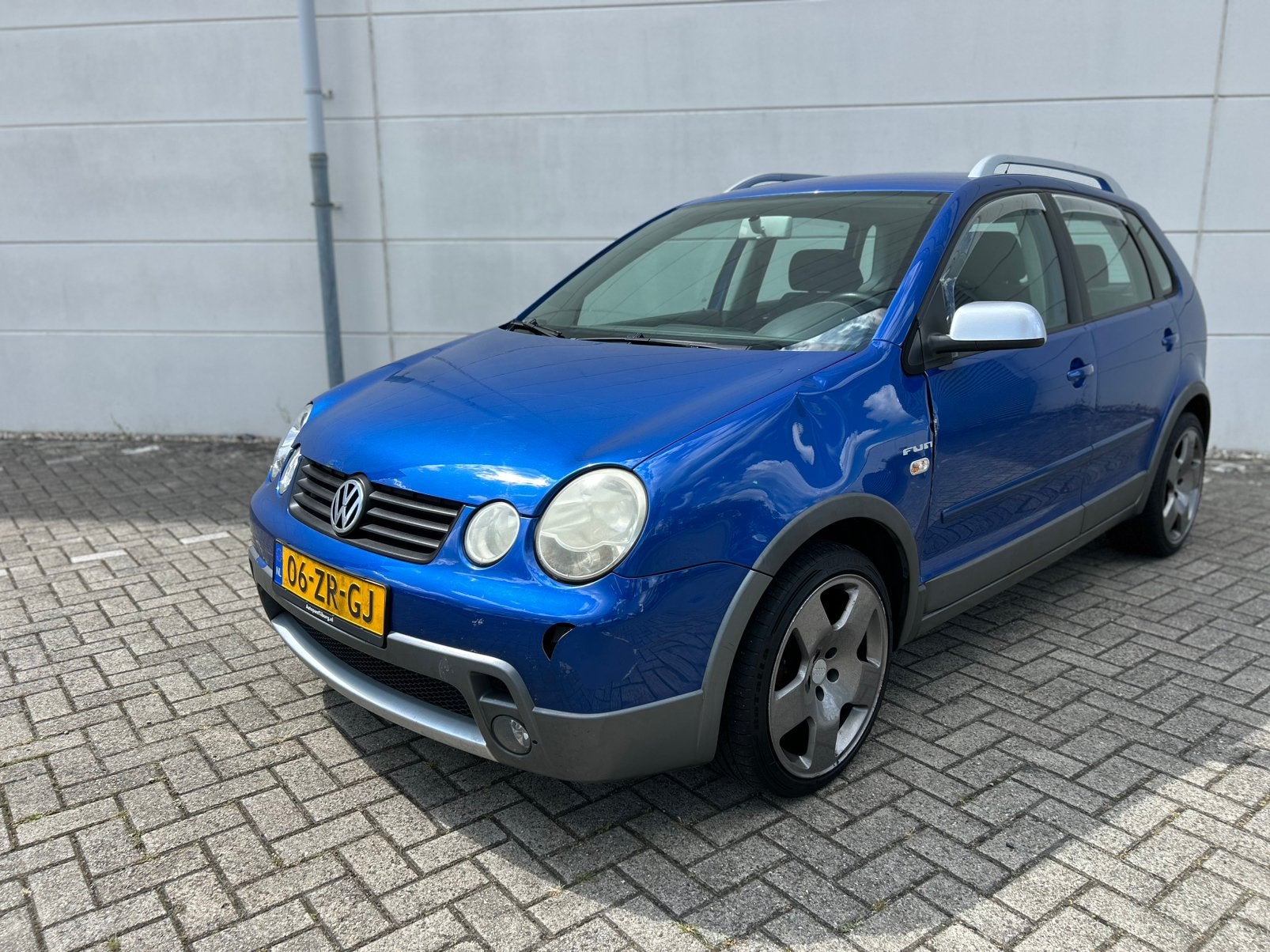 Volkswagen Cross Polo 2005 Blauw Airco Cruise Camera Apk, Auto's, Volkswagen, Stof, 1064 kg, Blauw, Bedrijf