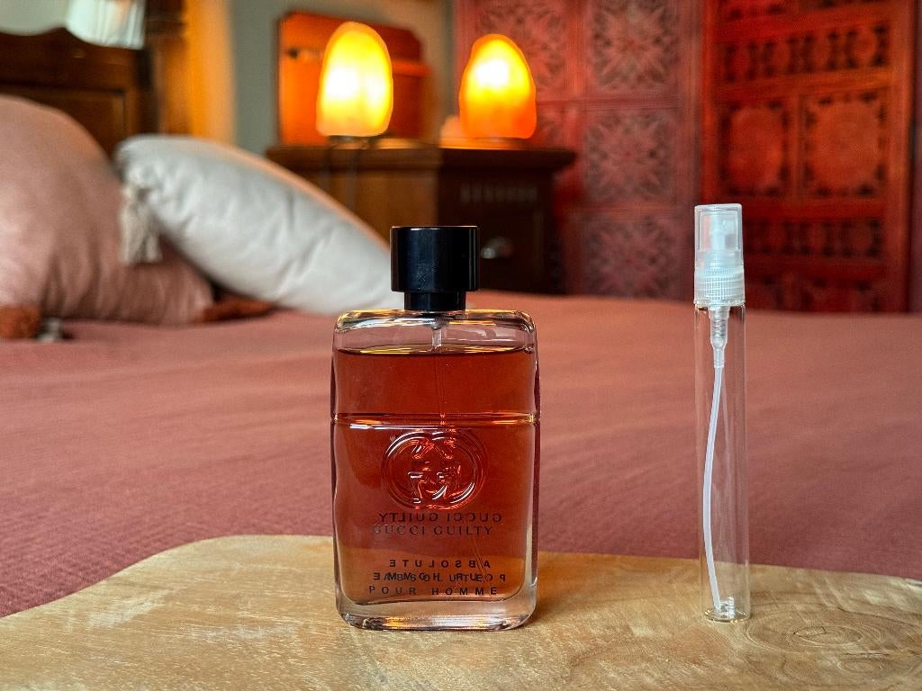 Gucci - Guilty absolute sample/decant, Sieraden, Tassen en Uiterlijk, Uiterlijk | Parfum, Zo goed als nieuw, Ophalen of Verzenden