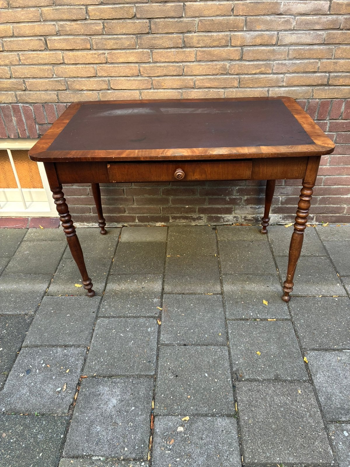 Antieke schrijftafel met lade, Ophalen