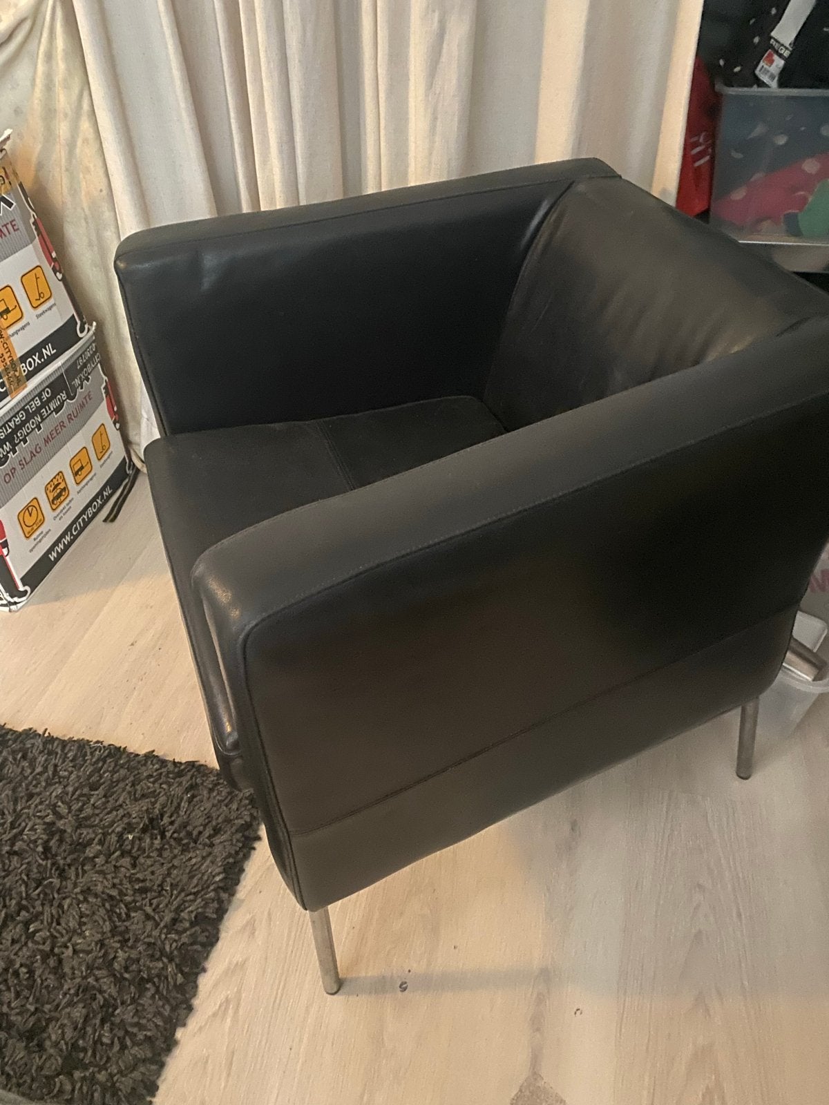 Zwarte leren fauteuil - IKEA, Huis en Inrichting, Fauteuils, Ophalen, Gebruikt, Leer, 75 tot 100 cm