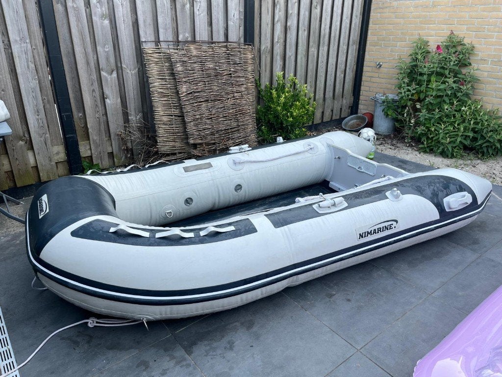 Rubberboot met buitenboordmotor, Watersport en Boten, Rubberboten, Ophalen, Airdeck, Gebruikt, Inclusief motor