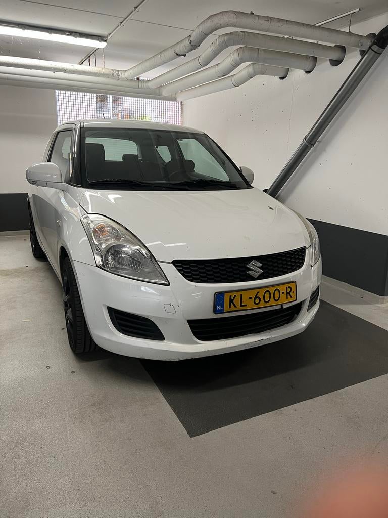 Suzuki Swift 1.2 3-D 2013 Wit, Voorwielaandrijving, Handgeschakeld, 93 pk, Particulier