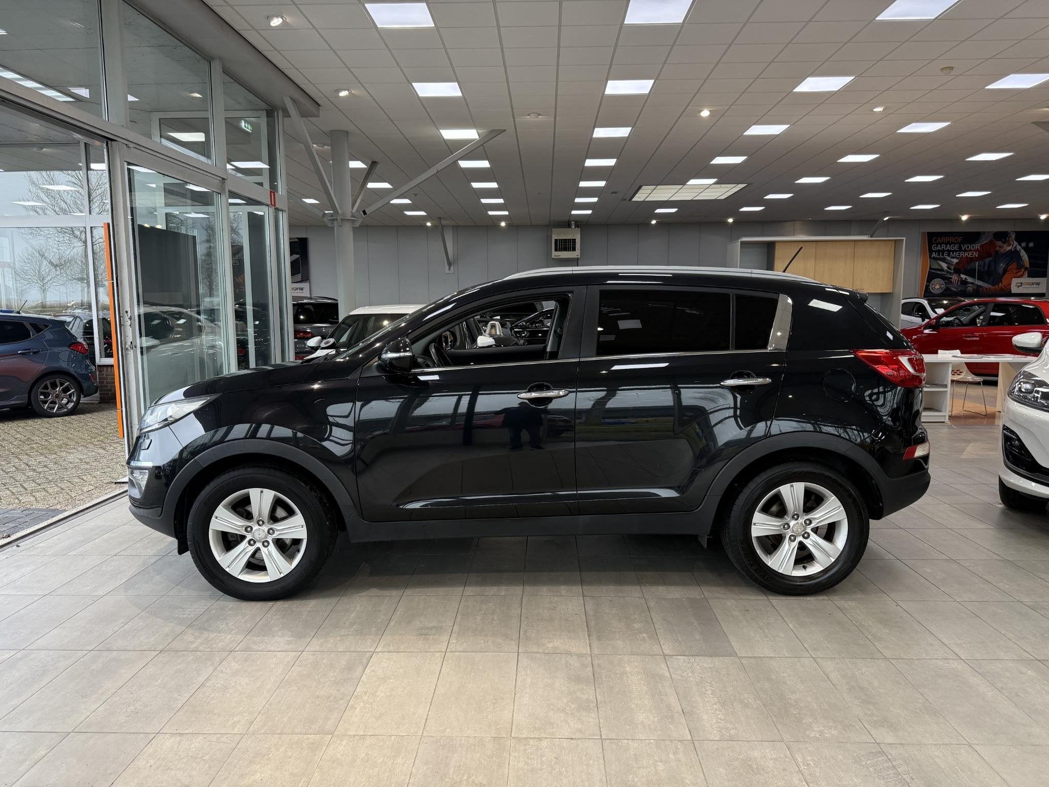 Kia Sportage 1.6 GDI Vibe 135PK met Lederen bekleding, Auto's, Voorwielaandrijving, Euro 5, 1591 cc, 4 cilinders