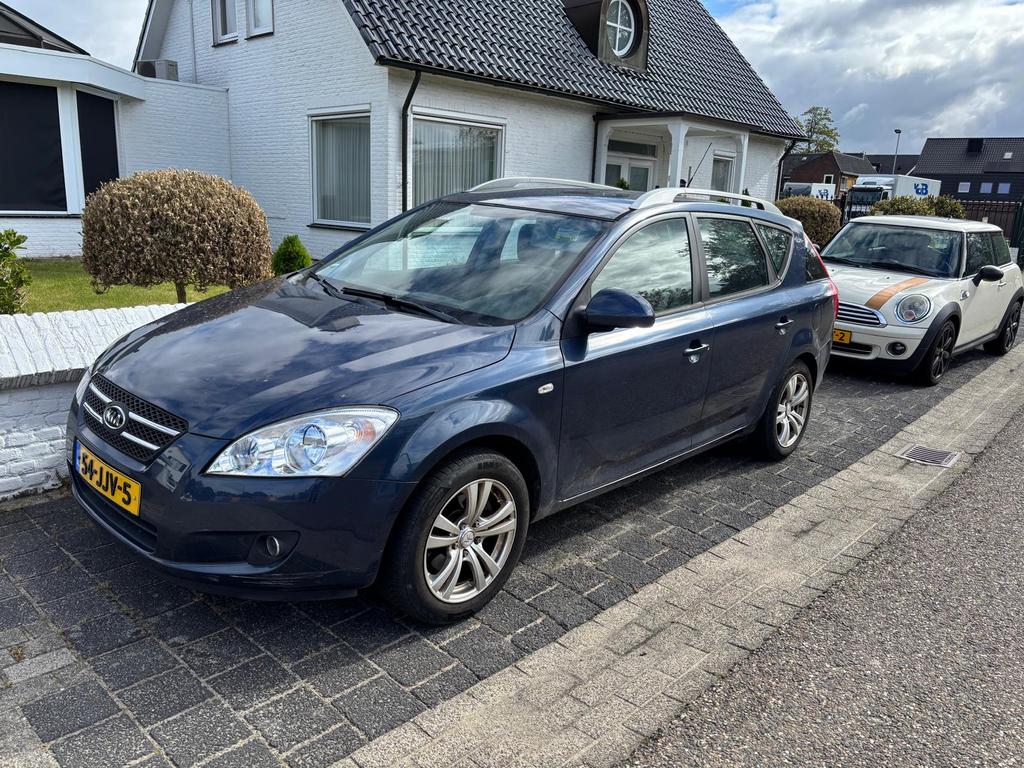 Kia Ceed 1.4 Sporty Wagon - Cruise Control, Half-Leer, Euro 5, 4 cilinders, Blauw, Leder en Stof