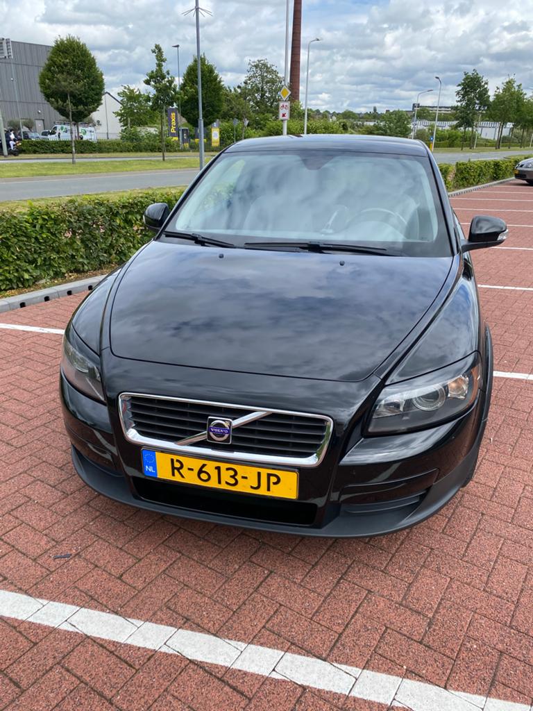 Volvo C30 1.6 2009 Zwart, 165 duizend KM, Auto's, Voorwielaandrijving, 1596 cc, Stof, 4 stoelen