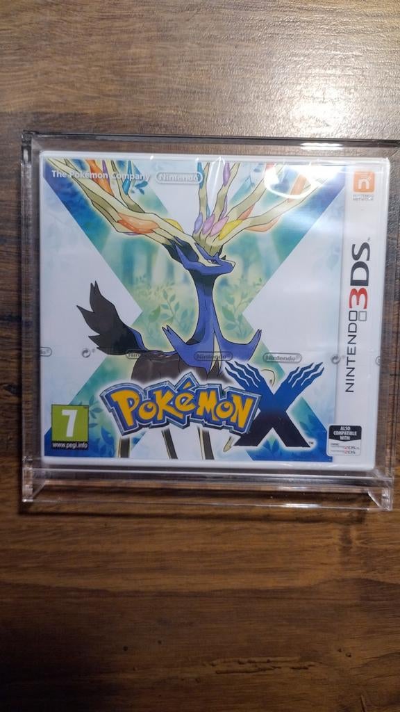 Pokémon X - Nintendo 3DS (Nieuw & Geseald) met Acryl Case, Spelcomputers en Games, Games | Nintendo 2DS en 3DS, Nieuw, Role Playing Game (Rpg)