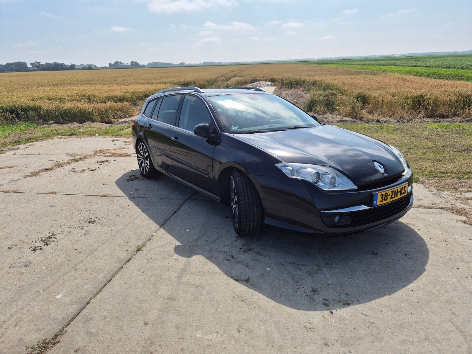 Renault Laguna Estate  apk tot 09-09-2027, Auto's, Renault, Laguna, Parkeersensor, 4 cilinders, Zwart