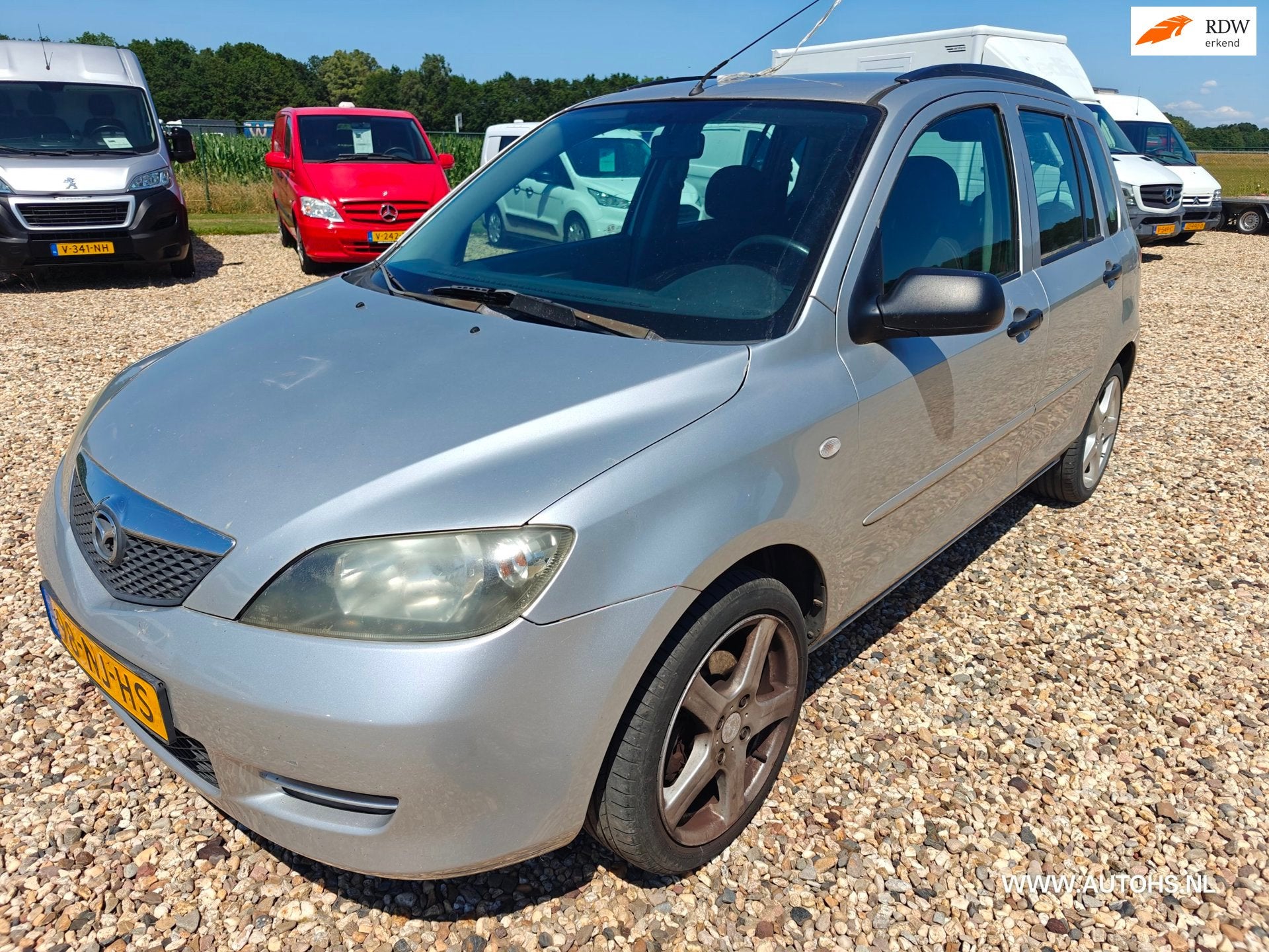 Mazda 2 1.4 Exclusive , 5 deurs, Voorwielaandrijving, 1025 kg, Zwart, 4 cilinders