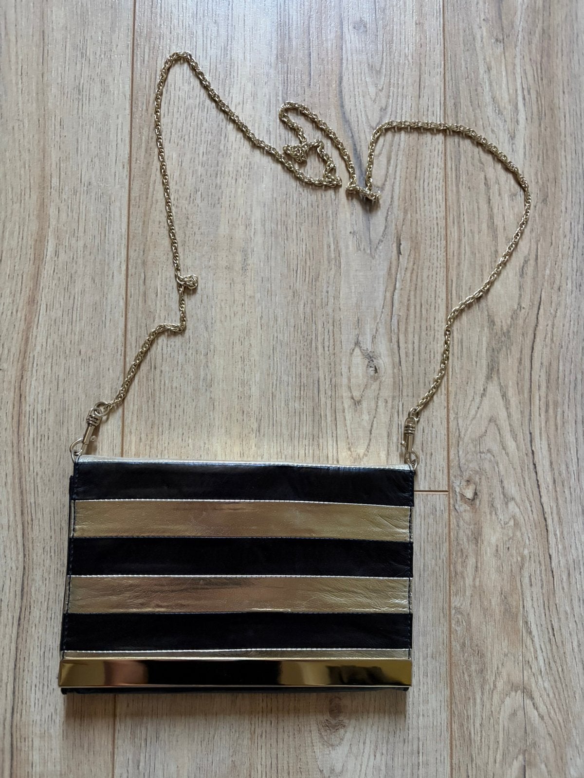Nieuwe tas / clutch met afneembaar hengsel goud zwart Mango, Ophalen of Verzenden, Nieuw, Zwart, Avondtasje