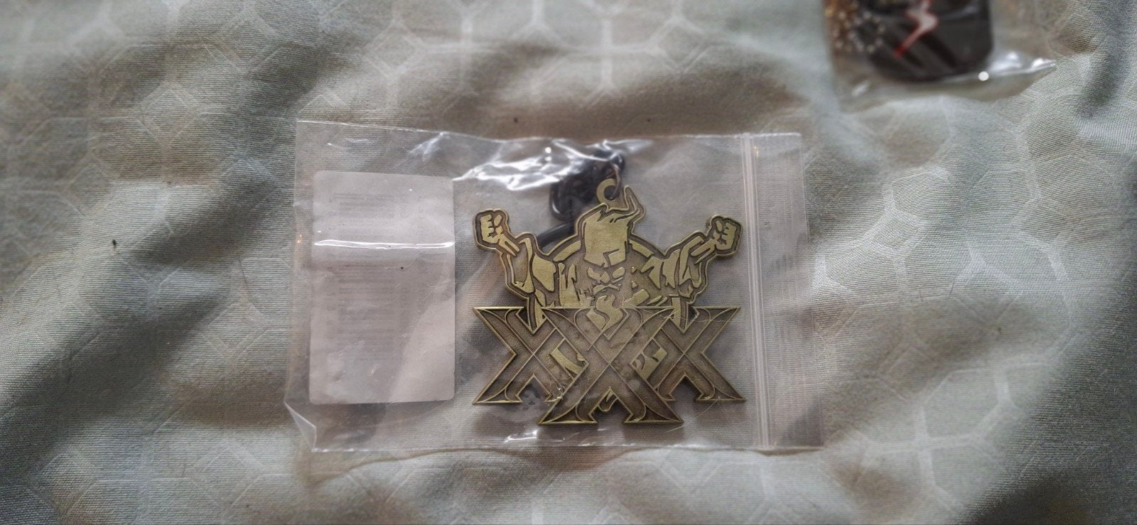 Thunderdome Keychain Gold - Nieuw in verpakking, Verzamelen, Sleutelhangers, Ophalen of Verzenden, Nieuw, Merk