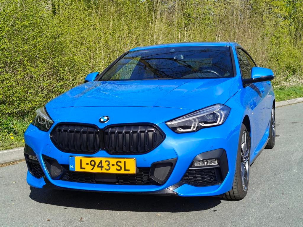 Te koop BMW 218i gran Coupe Executive M-sport, Voorwielaandrijving, Blauw, Leder en Stof, Handgeschakeld