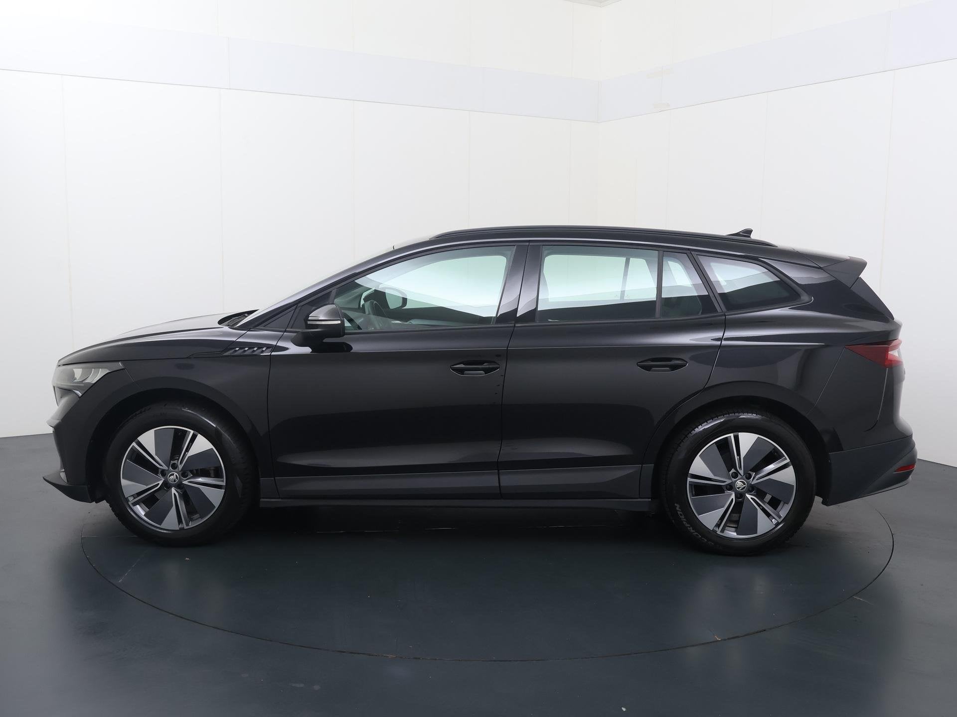Skoda Enyaq iV 60 | 180 PK | SoH 89% | Achteruitrijcamera |, Auto's, Automaat, Achterwielaandrijving, Leder en Stof, Zwart