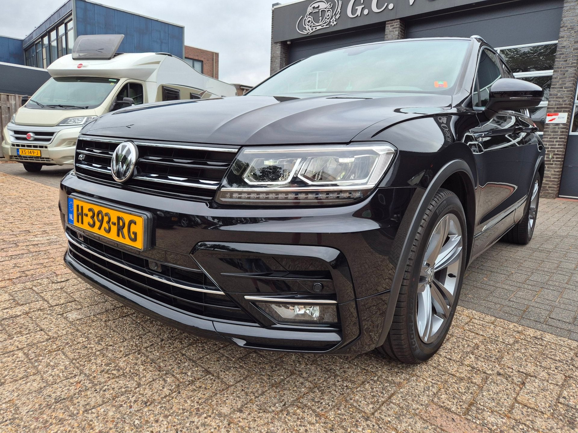 Volkswagen Tiguan 1.5 TSI ACT Highline Business R, Auto's, 4 cilinders, 150 pk, Zwart, Origineel Nederlands