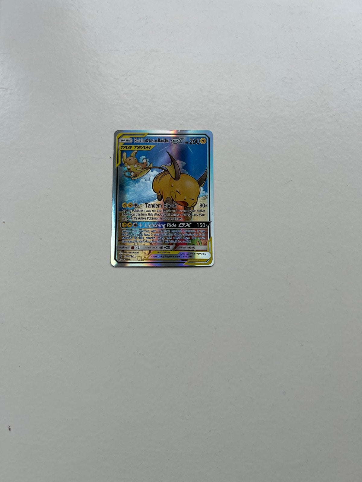 Raichu & Alolan Raichu GX Pokémon kaart (lichte schade), Hobby en Vrije tijd, Ophalen of Verzenden, Gebruikt, Losse kaart