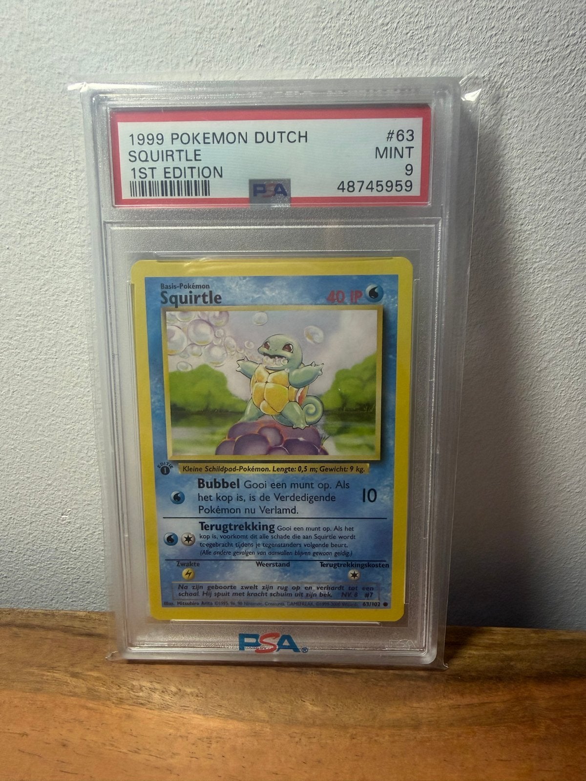 Squirtle 1999 Dutch 1st Edition PSA 9 Mint Pokémon Kaart, Ophalen of Verzenden, Zo goed als nieuw, Losse kaart