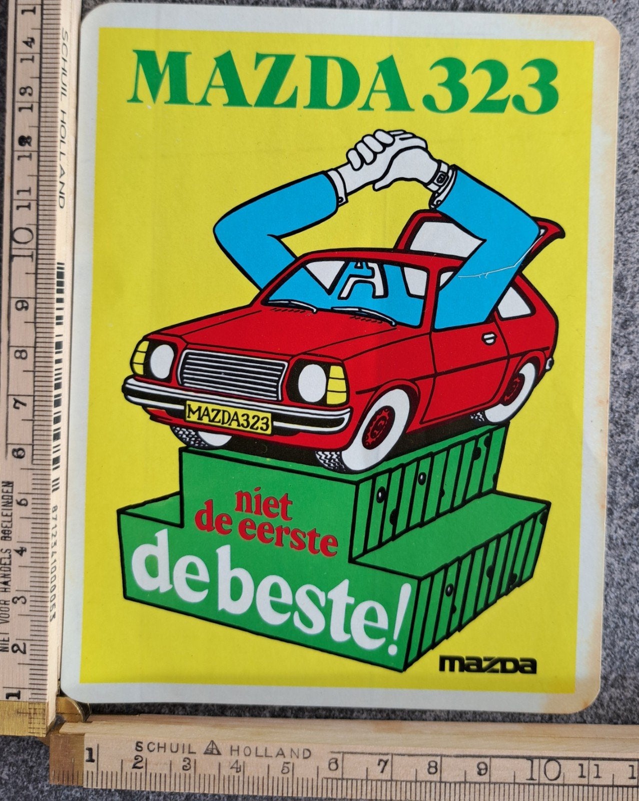 vintage sticker MAZDA 323 niet de eerste de beste, Ophalen of Verzenden, Zo goed als nieuw