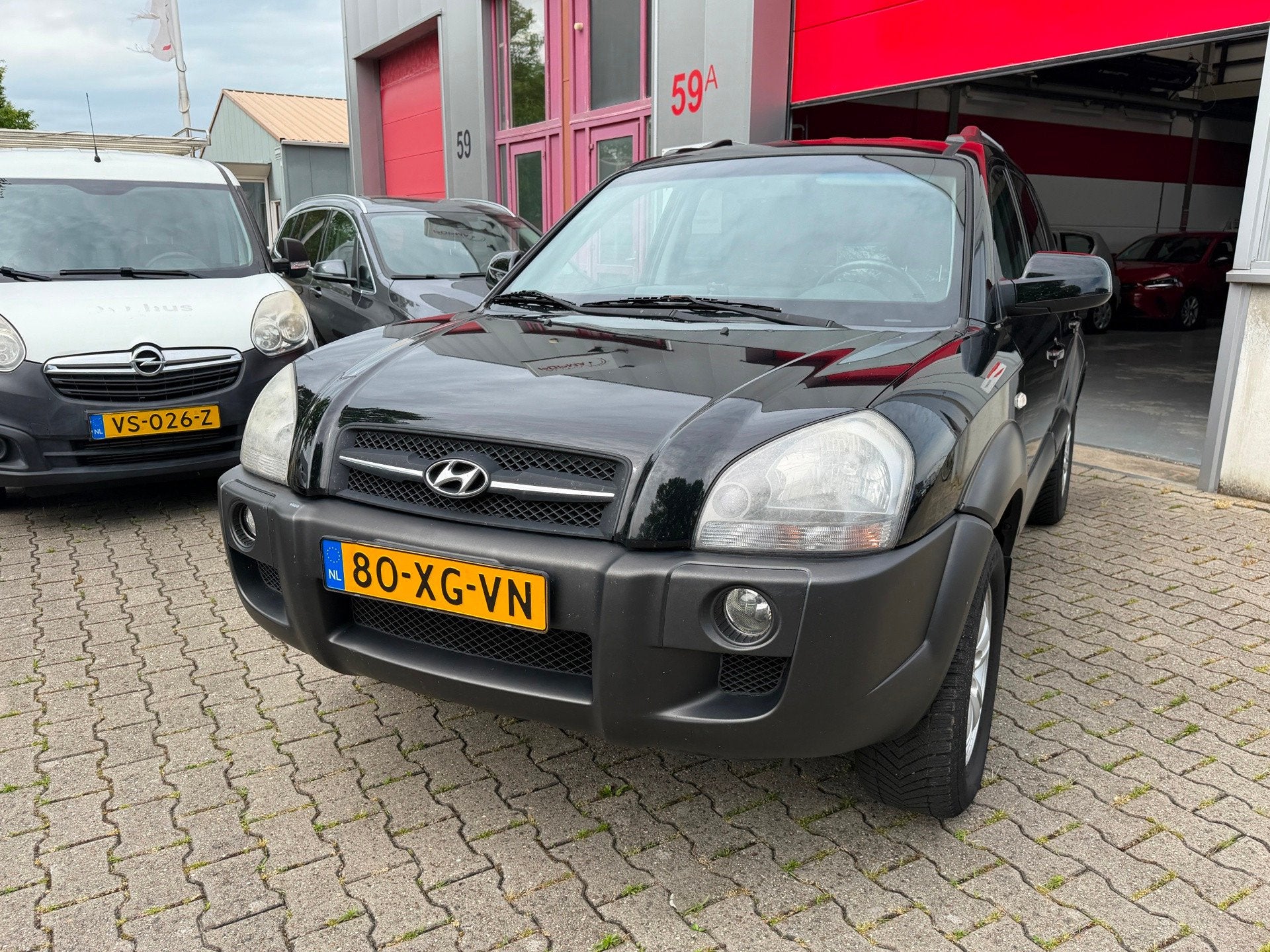 Hyundai Tucson 2.0i Style Premium mini - Camper, Gebruikt, 4 cilinders, Zwart, Handgeschakeld